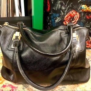 Large black travel bag. Fits laptop, tablet, and then some!